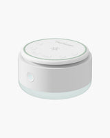 Momcozy Portable Baby Sound Machine - White and blue design, for baby sleep. Includes control buttons and brand logo.