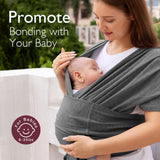 Baby wrap carrier, promoting bonding. Comfortable, hands-free design for babies; gray material.