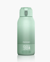 Momcozy mint green portable milk warmer, LCD display, 98°F, perfect for travel and fast milk heating.
