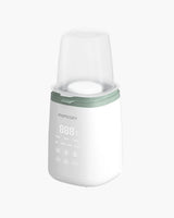 Momcozy 6-in-1 Fast Baby Bottle Warmer with digital display, green top, and protective cover for warming bottles, heating food, and thawing frozen milk