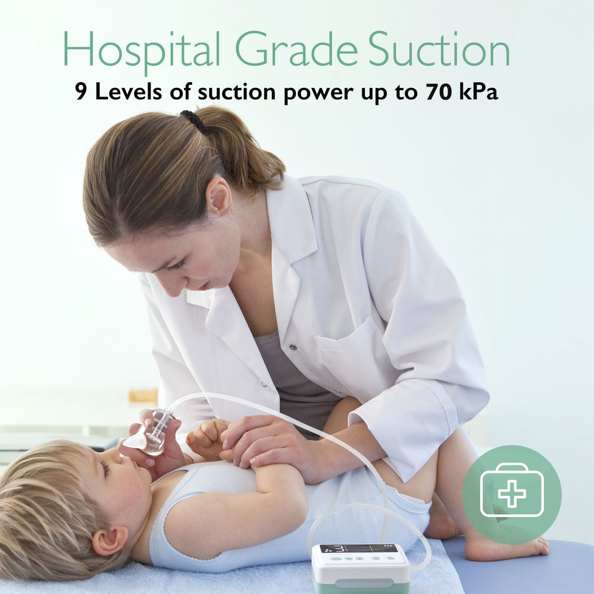 Momcozy nasal aspirator in use.  Healthcare worker using aspirator with 70 kPa suction on infant.