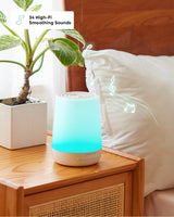 Momcozy Smart Baby Sound Machine with teal night light and 34 soothing sounds, designed for baby sleep and app control.