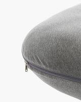 Gray U-shaped maternity body pillow, close-up detail of fabric texture and zipper for easy cover removal and support.