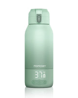 Momcozy portable milk warmer, mint green, LCD display showing 37°C, perfect for travel and fast milk heating