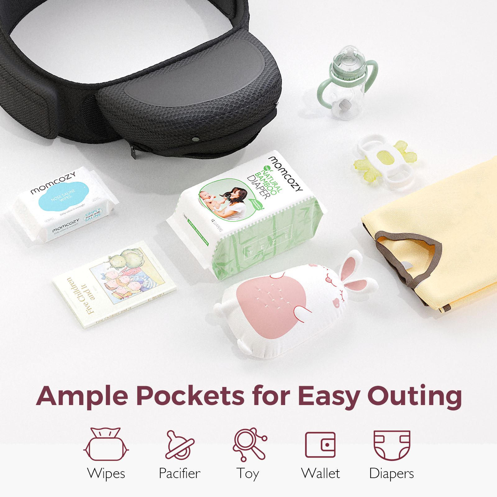 Momcozy Hip Seat Carrier with essentials: wipes, diaper, toy, and bottle. Perfect for outings with ample pocket storage.