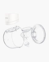 Momcozy S12 Pro breast pump components including flange and charging dock for easy use.