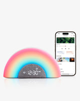 Momcozy DreamSync baby sound machine with rainbow light and app control, featuring the time, and rainforest sound options.