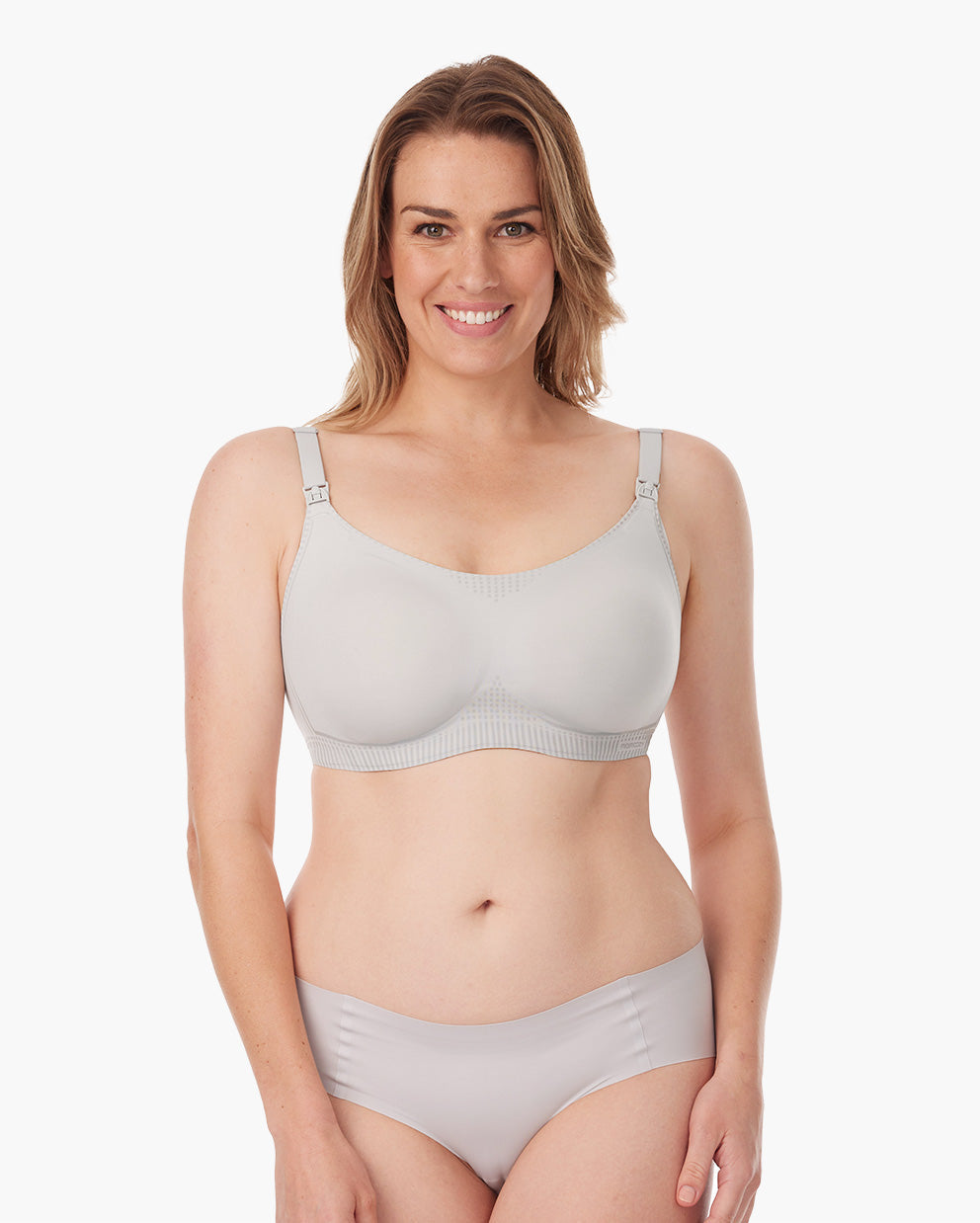 Model smiling in U Liquid Spandex Nursing Bra, showcasing soft and supportive material.