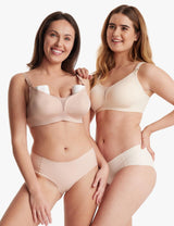 Two women smiling, wearing Mesh Support Padded Wireless Bras in beige and Oyster Pink shades.